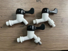 Single plastic wall-mounted water tap